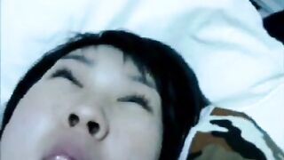 An amateur Asian girl masturbates her nipples with homemade porn style