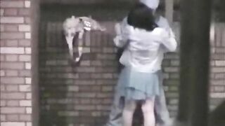 Two Japanese girls are getting fucked outdoors by a couple in public